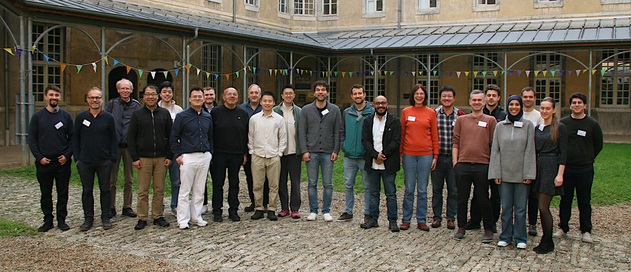 Group picture of Ph.D. students and supervisors from ModConFlex in yard of former monastry